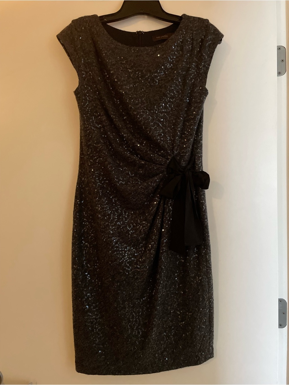 The Limited Black Sequin Midi Dress with Side Bow